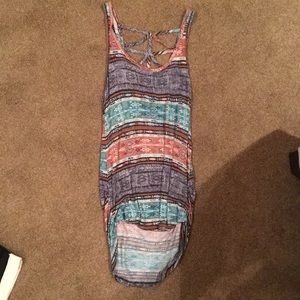 Adorable tank top! Patterned with cutout in back
